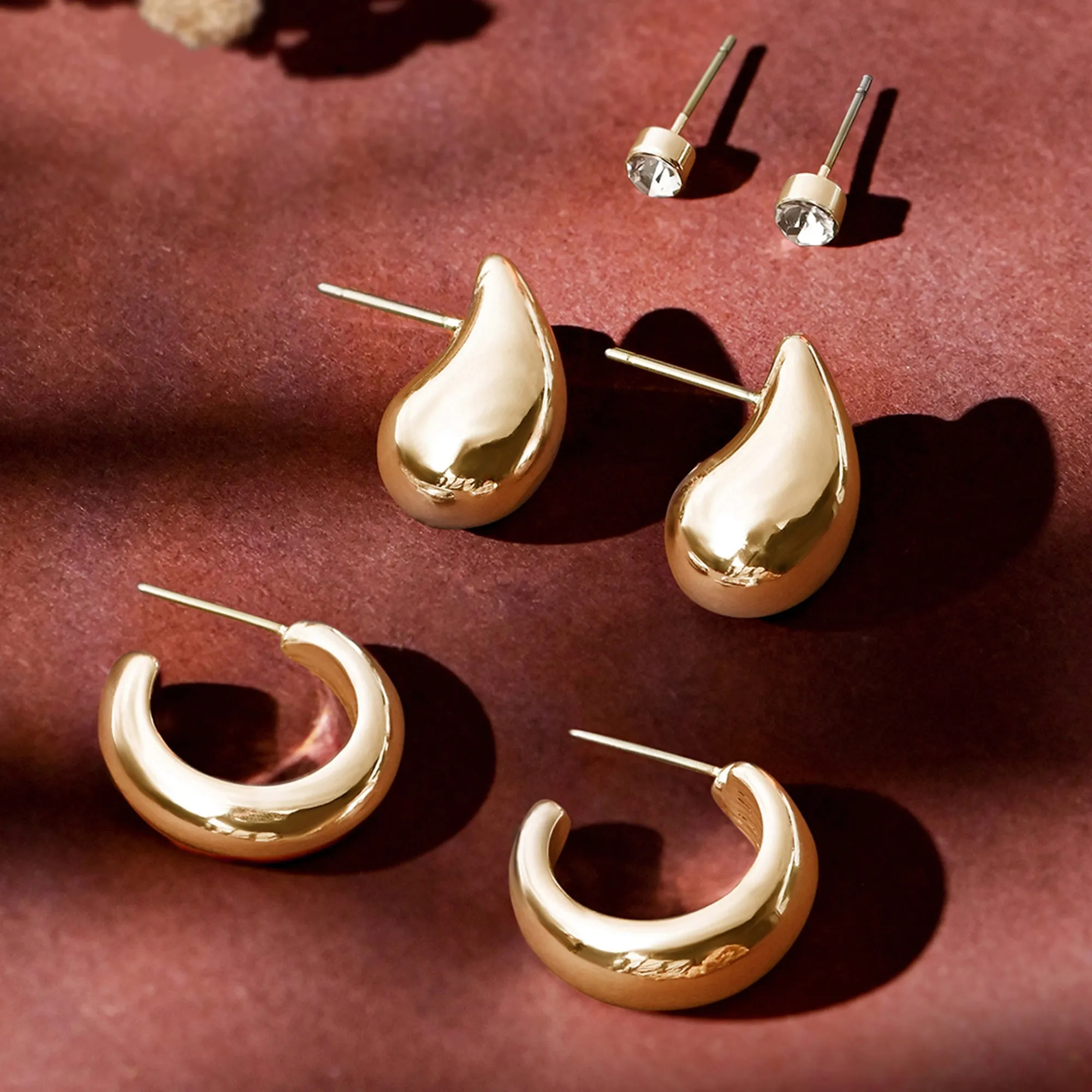 Gold Curve Drop Earrings Set Of 3