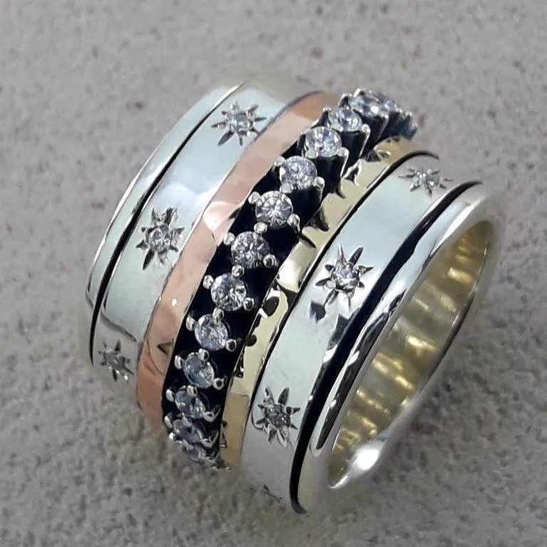 Israeli spinner rings Silver Gold and cz zircons