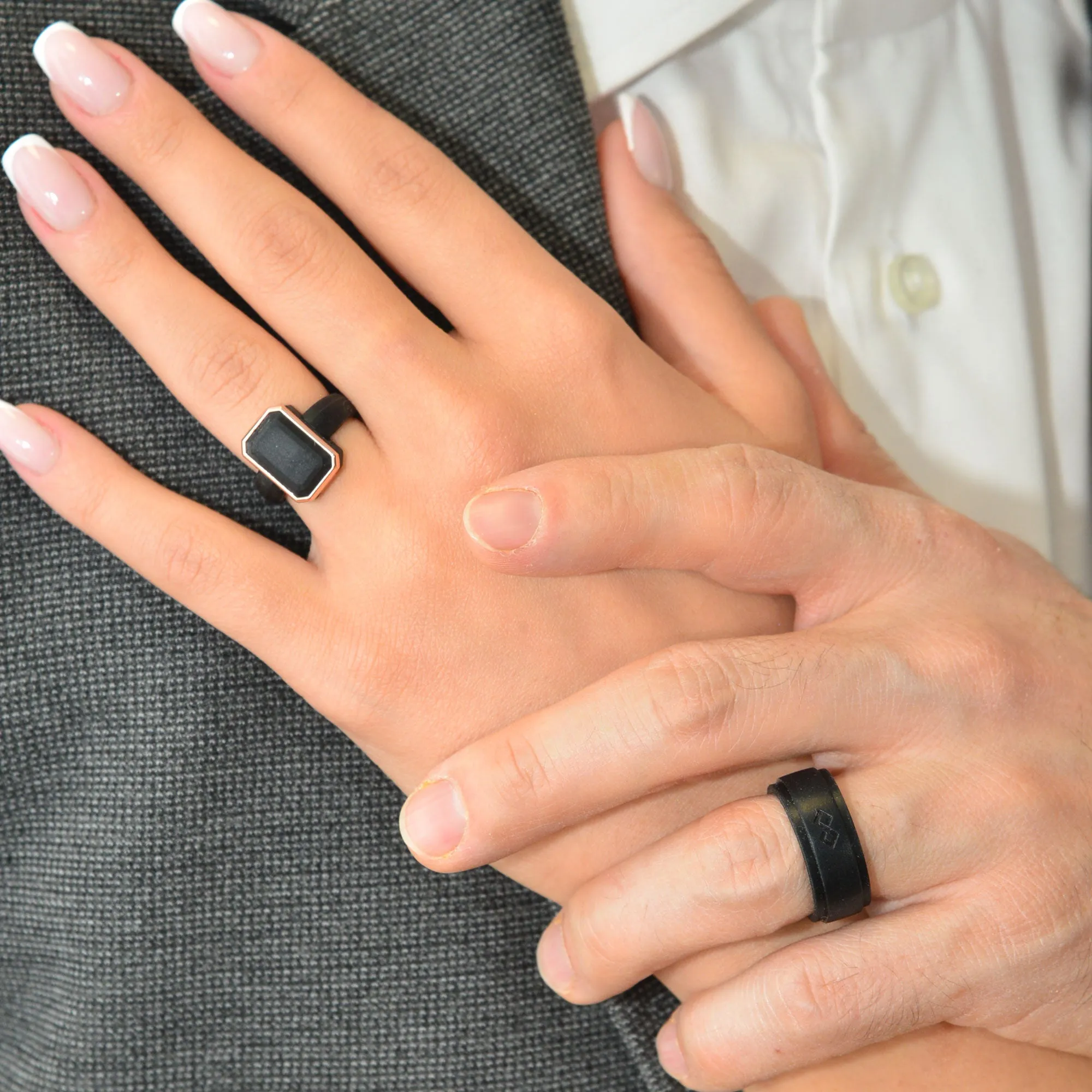 Set of Two Rings: Women's Black Emerald  & Men's Infinity Collection