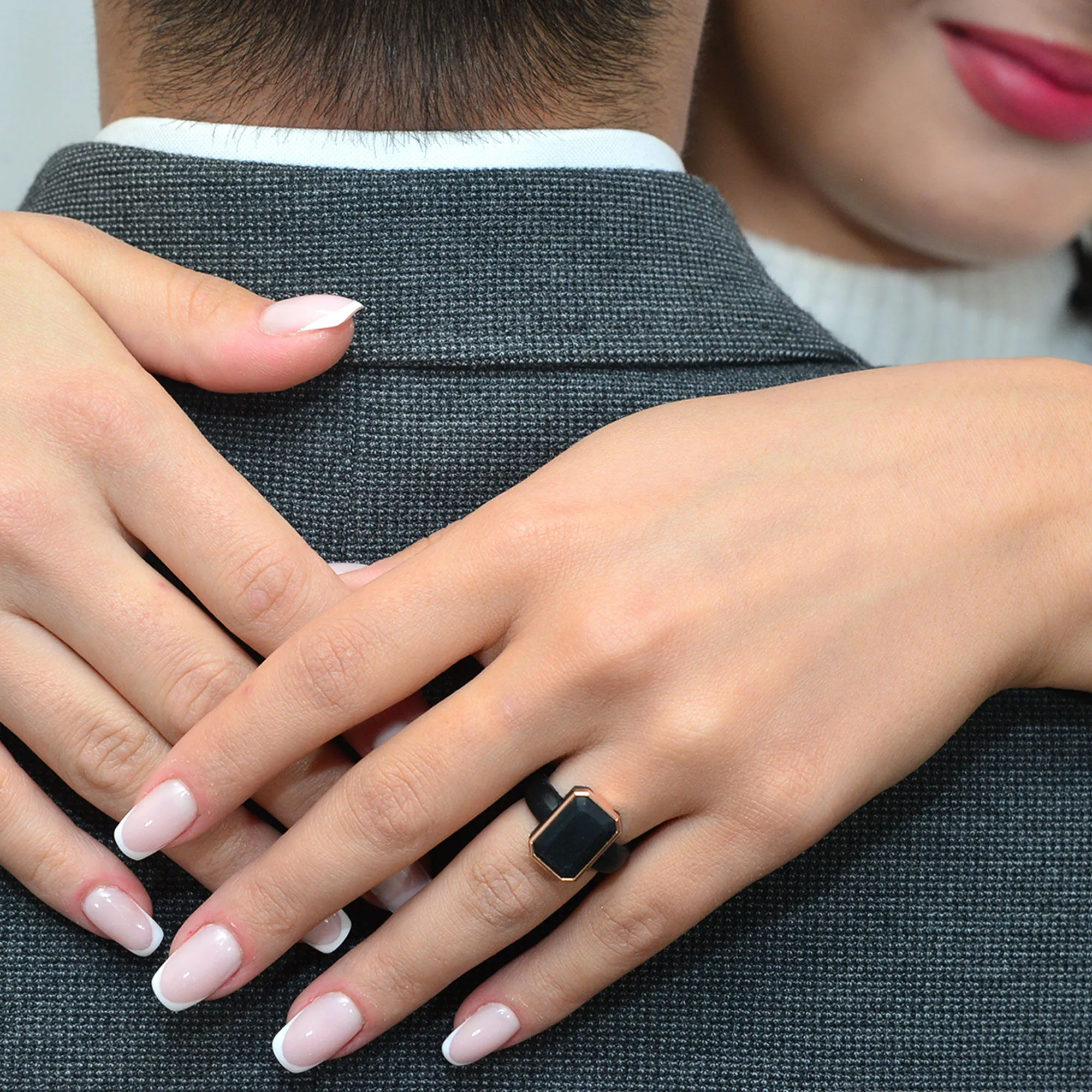 Set of Two Rings: Women's Black Emerald  & Men's Infinity Collection